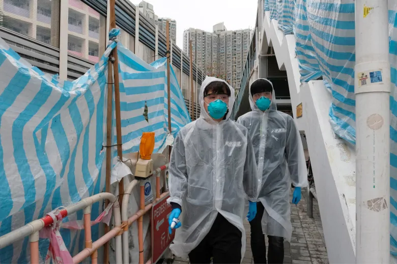 Hong Kong reports virus death as workers strike at hospitals | CBC News