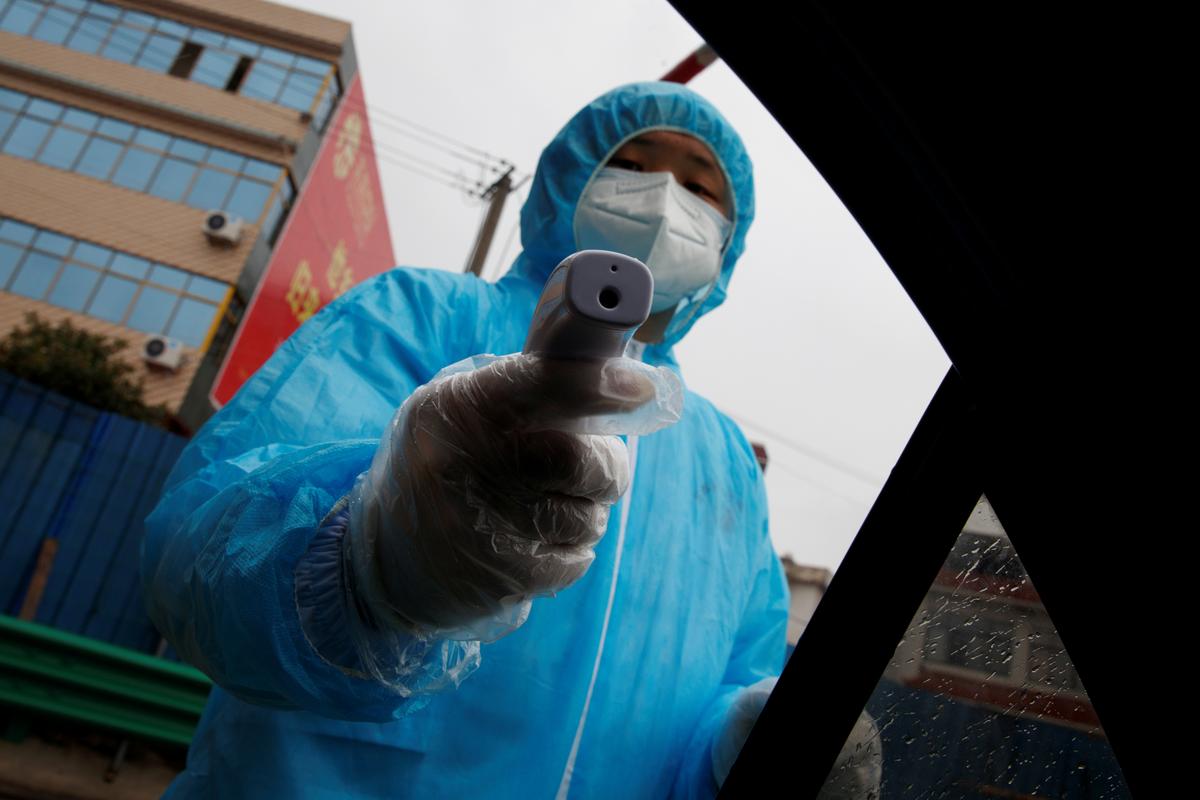 Chinese city accused of stealing virus masks from hard-hit neighbour