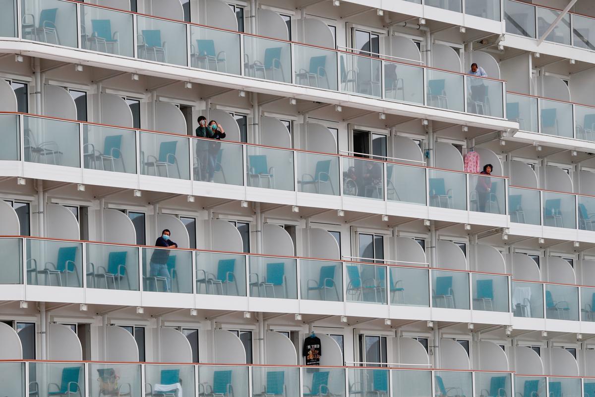 China wages ‘people’s war’ on coronavirus as cruises, companies hit