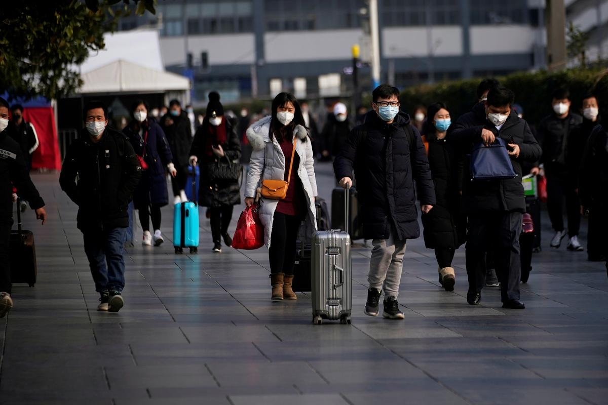 China slowly goes back to work as coronavirus toll strikes everyday record