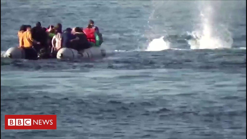 Greek coast guards fire into sea near migrant boat