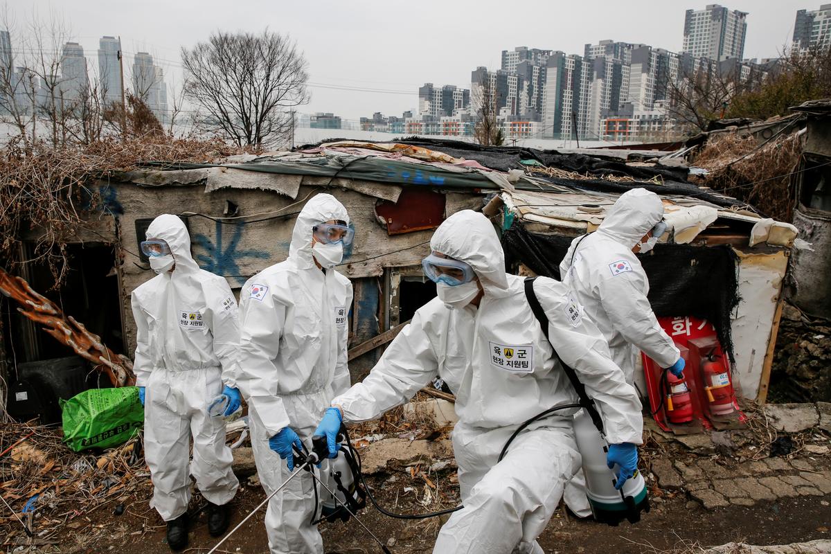 Thousands wait for hospital beds in South Korea as coronavirus cases surge