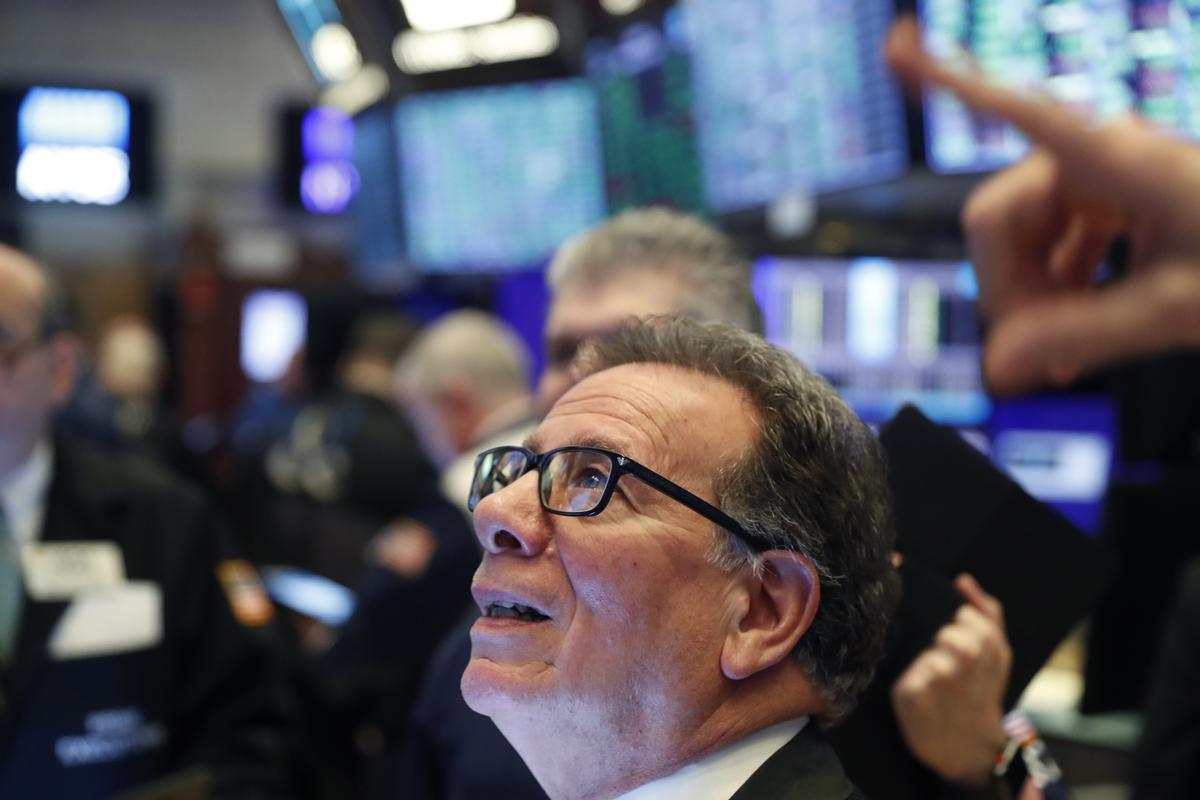 Wall Street pares gains as report says Trump to declare nationwide emergency situation