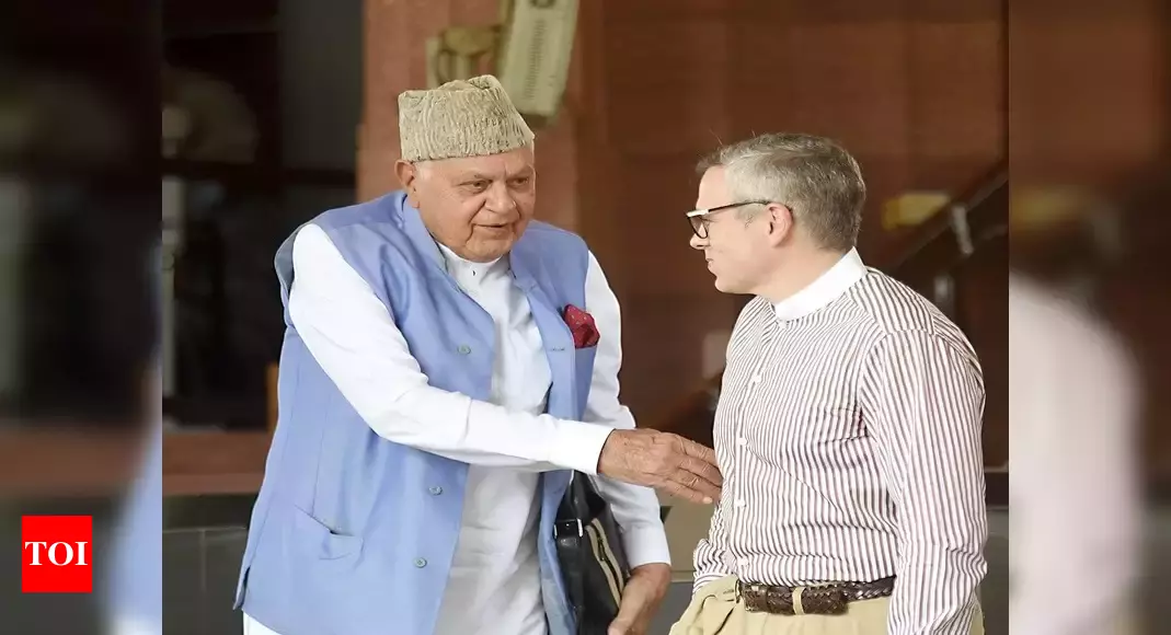 NC chief Farooq Abdullah meets his kid Omar Abdullah in sub-jail in Srinagar