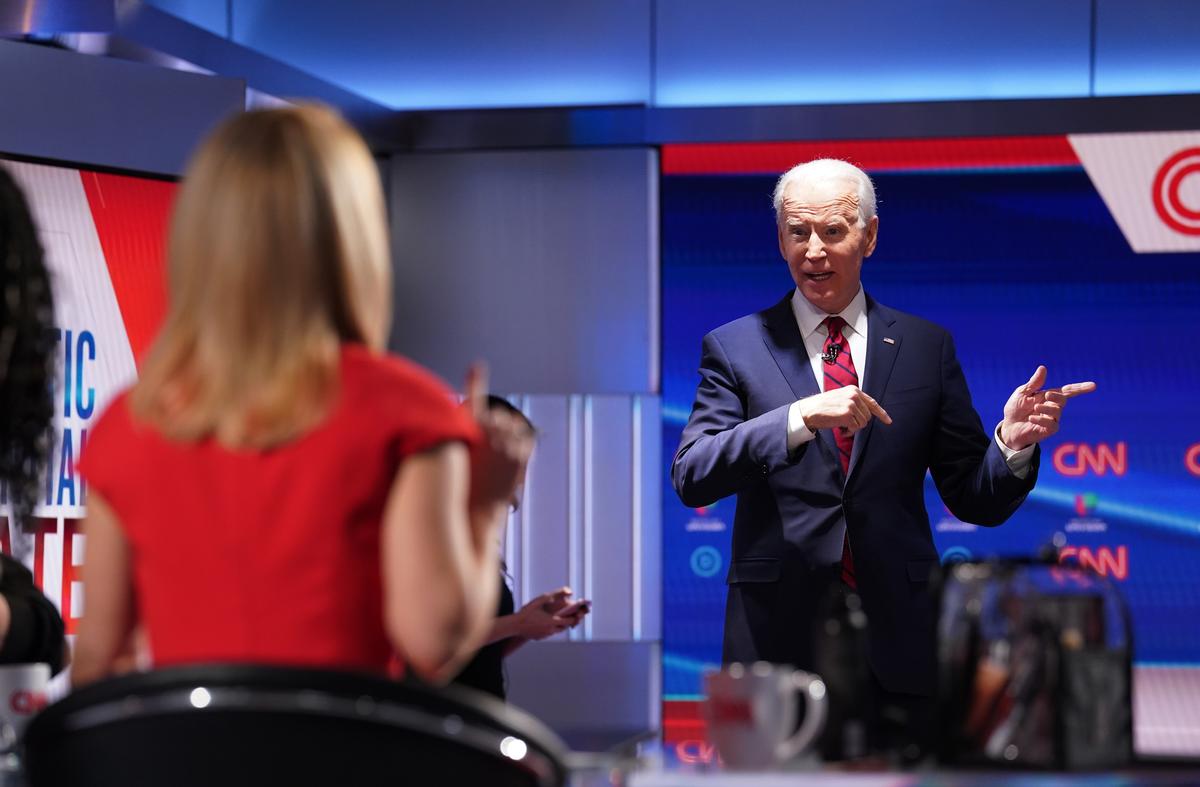 Democratic White House competitor Biden states he would pick a lady as vice president