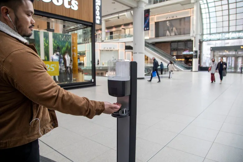 As people stay home, malls and stores limit their hours and airlines cut flights | CBC News