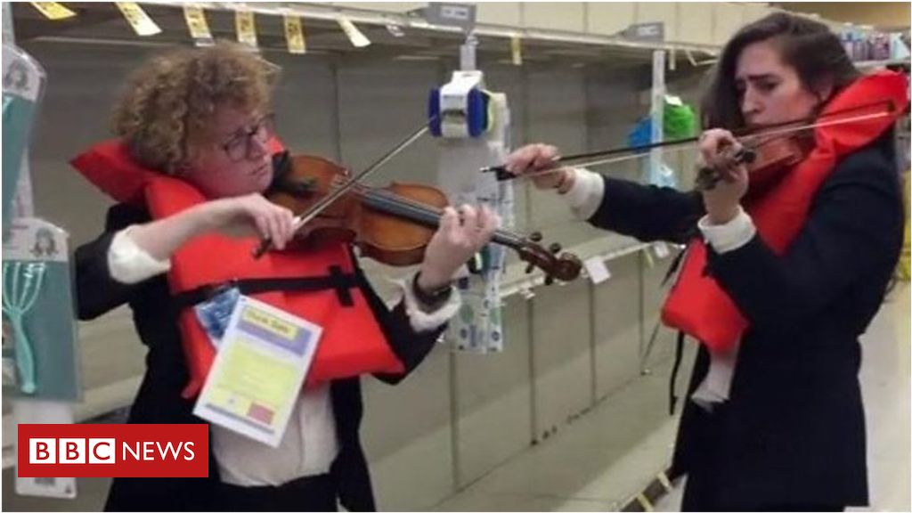 ‘Laugh or weep’: Duo plays Titanic hymn to buyers