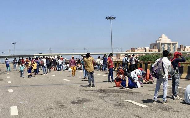 Coronavirus lockdown | As inter-State buses dwindle, migrants are stuck on Yamuna Expressway with nowhere to go