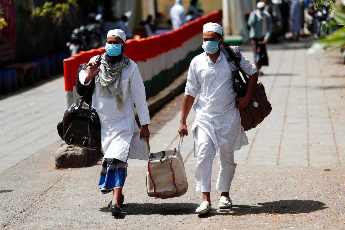 Racing to stop coronavirus, India searches mosques to trace contacts with Delhi event