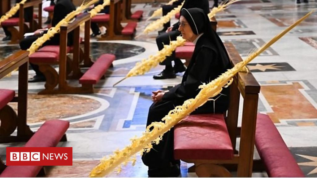 Pope marks Holy Week in near-empty basilica