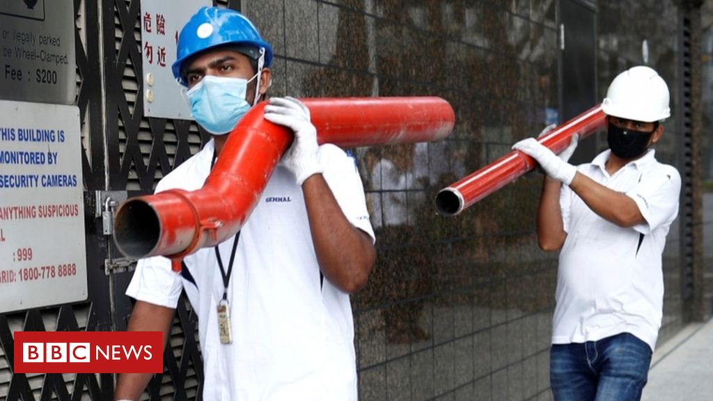 Singapore quarantines 20,000 migrant employees