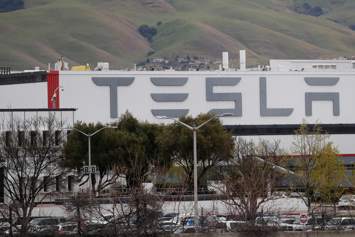 Tesla to furlough employees, cut staff member salaries due to coronavirus