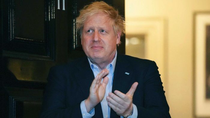 Coronavirus-hit Boris Johnson ‘sitting up in bed’, but stays in extensive care