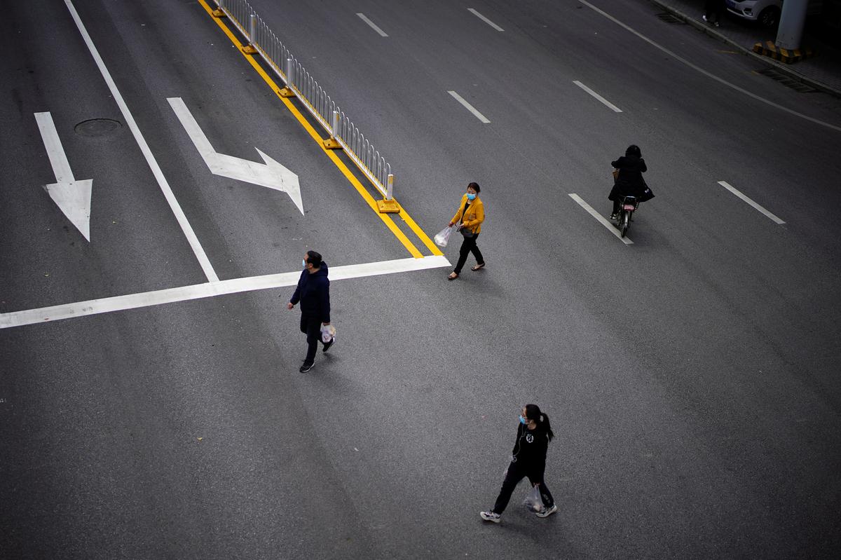 China tightens Russia border checks, approves coronavirus vaccine trials