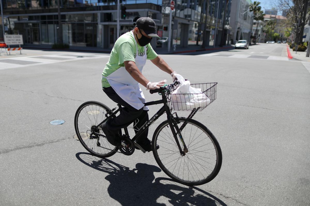 Face masks may be ‘new normal’ in post-virus life as U.S. prepares gradual reopening