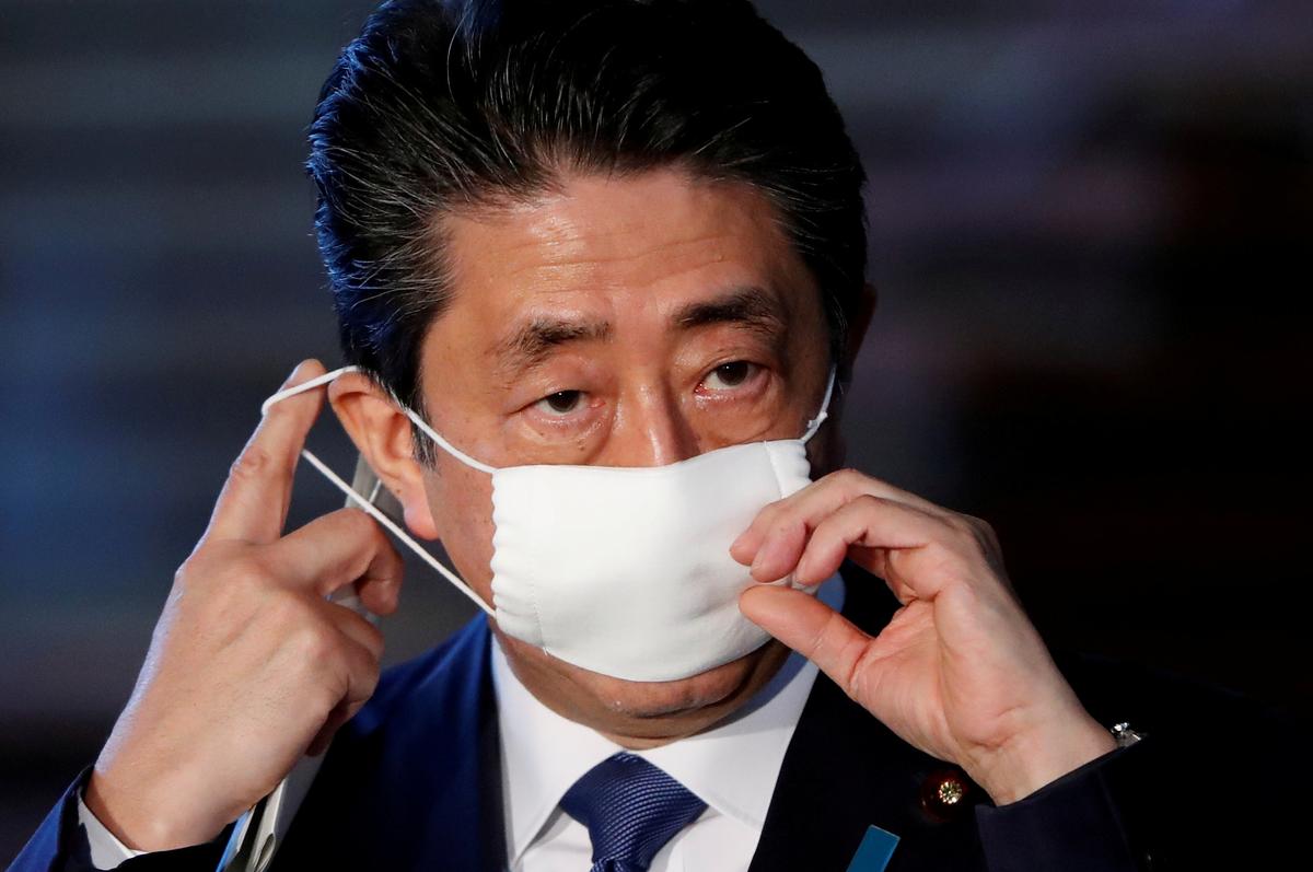 Japan set to broaden coronavirus emergency situation as Abe strategies money payouts for all