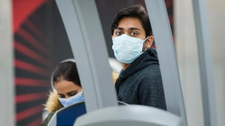 Air passengers will be required to wear non-medical masks starting April 20 | CBC News