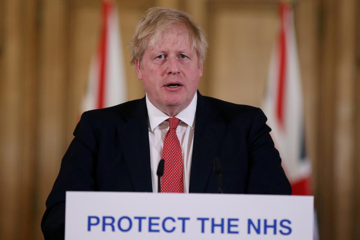 UK PM Johnson under fire over handling of coronavirus crisis