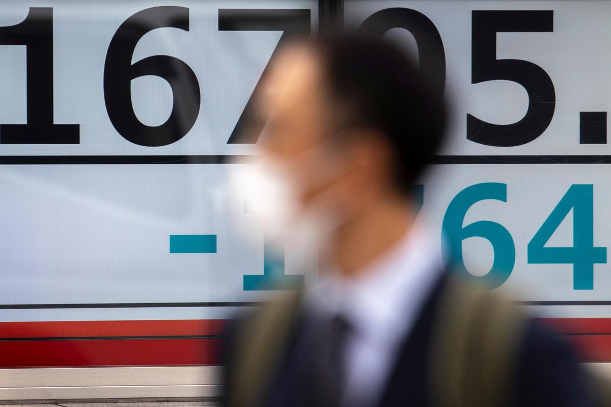 Asia shares extend gains as economies slowly re-open, oil rallies