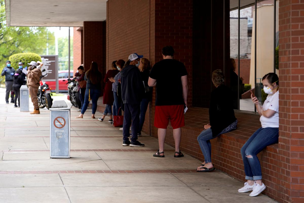 Millions of Americans likely applied for unemployed benefits last week though wave is stabilizing