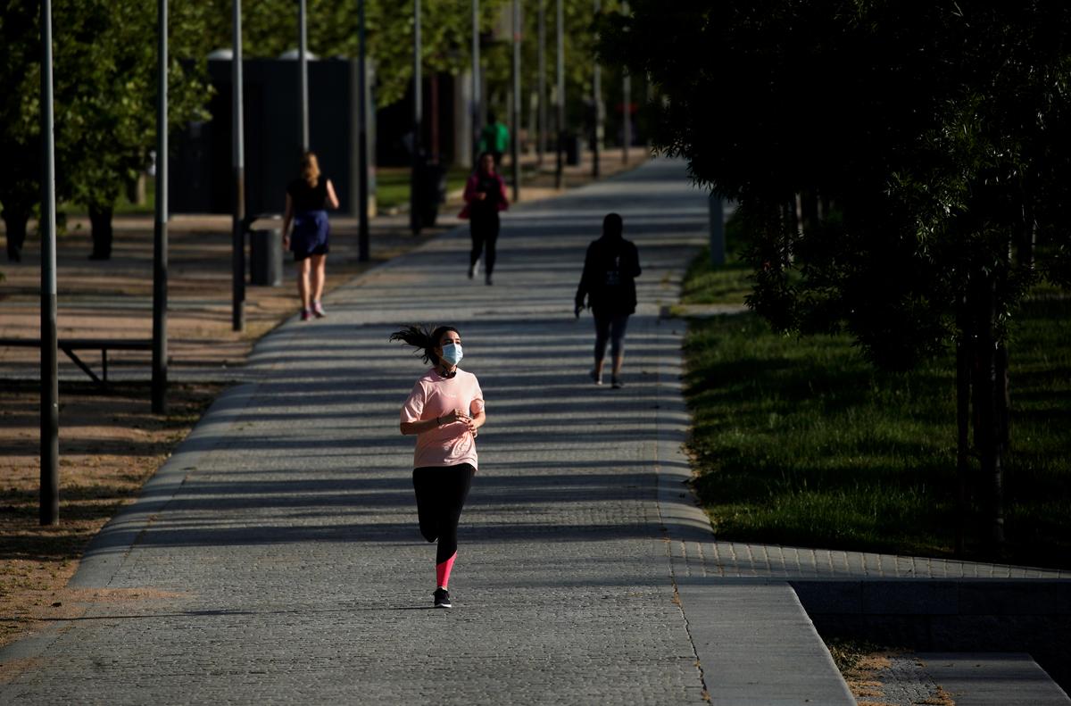 Free at last! Spaniards get outside to exercise after 49 days of lockdown