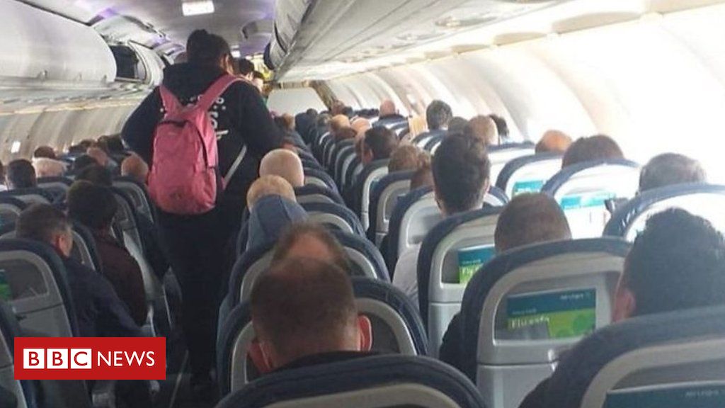 ‘There was no social distancing on the flight’