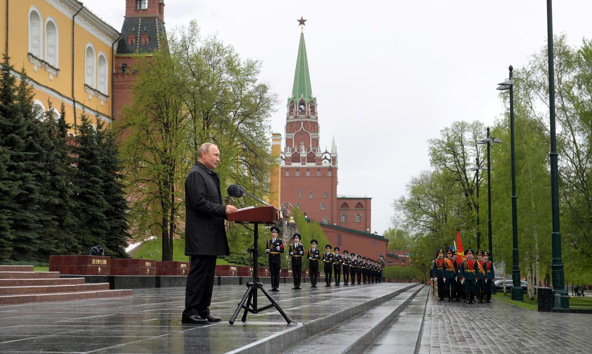 Russia’s Putin urges unity as he presides over slimmed down Victory Day