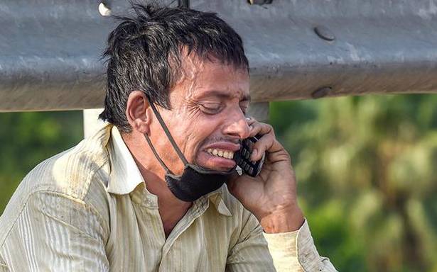 Picture of a weeping Rampukar Pandit becomes sign of India’s migrant worker tragedy