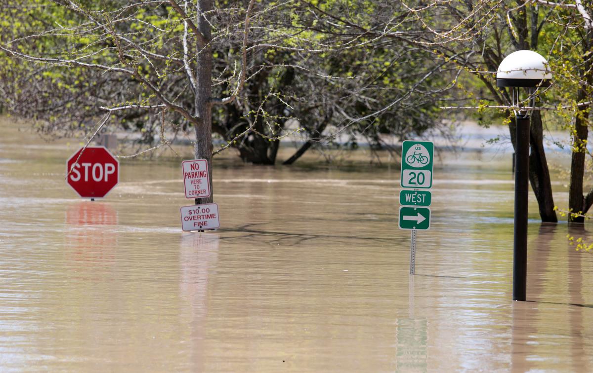 Michigan flooding forces thousands to leave, threatens chemical plant