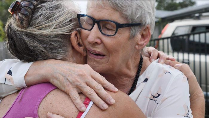 Retired nurse denied COVID-19 travel exemption four times is reunited with dying sister at last