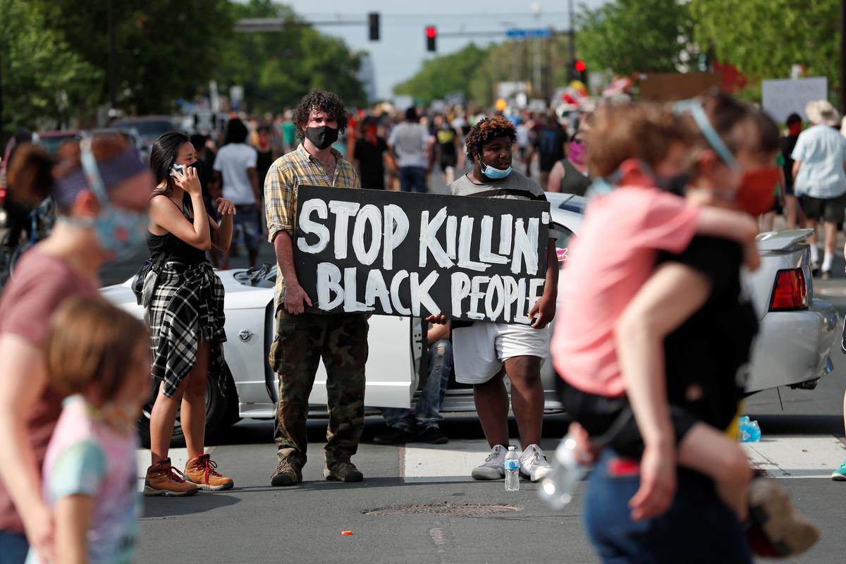 Four Minneapolis policemen fired after death of unarmed black man