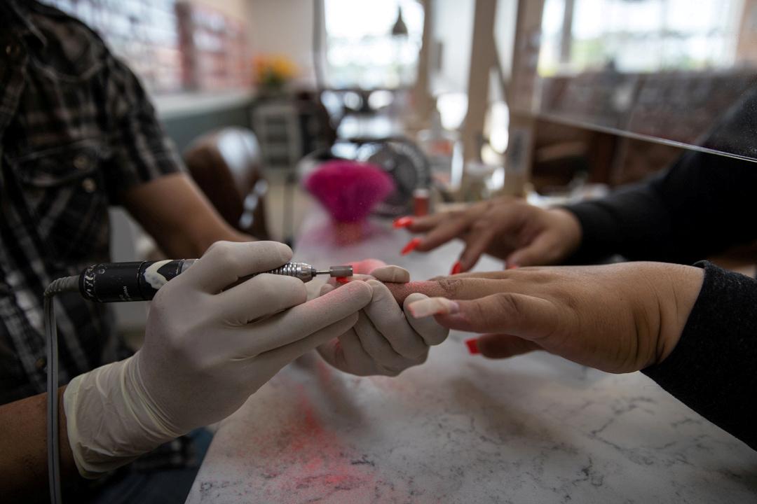 As lockdowns ease, a Bronx nail beauty parlor prepares a careful resuming