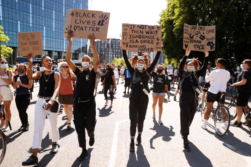 Hundreds of protesters rally in London, Berlin over U.S. death