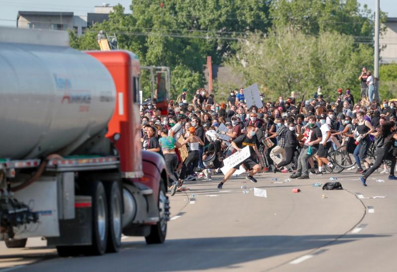 Truck drives into protesters on Minneapolis highway