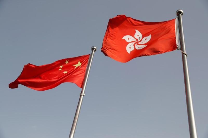 Protest disrupts Hong Kong legislative debate over China national anthem bill