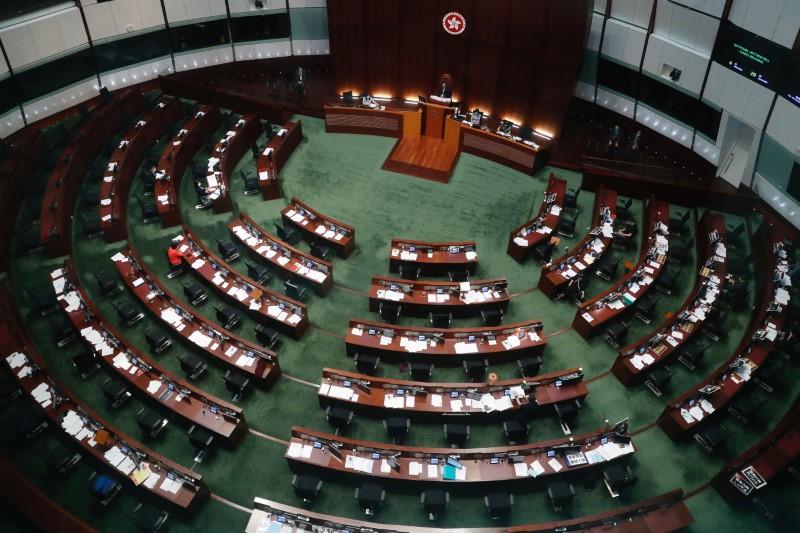 Hong Kong pro-democracy legislators protest amid anthem bill debate