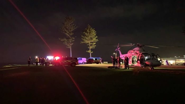 Cops rescue two individuals off Illawarra beach, search continues for missing out on man and kid after boat capsizes