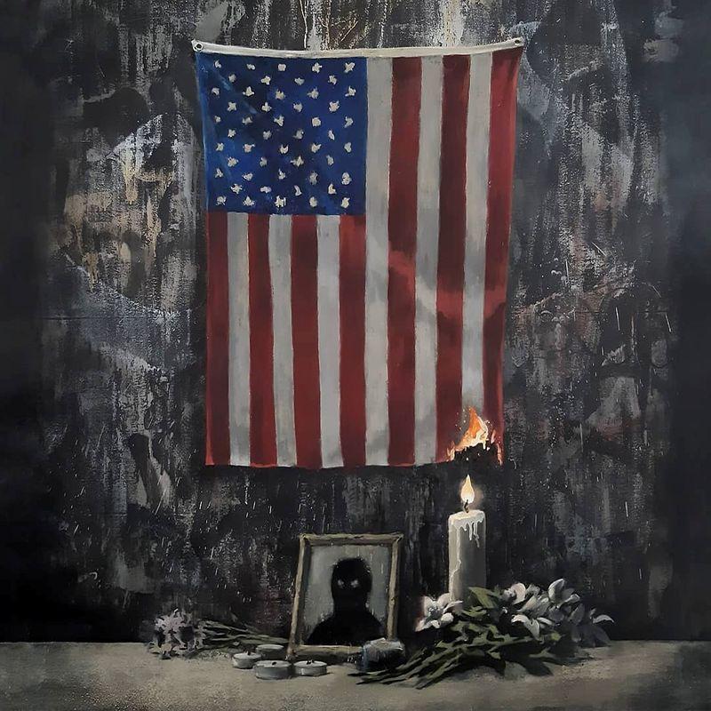 Britain’s Banksy depicts U.S. flag on fire in Floyd tribute