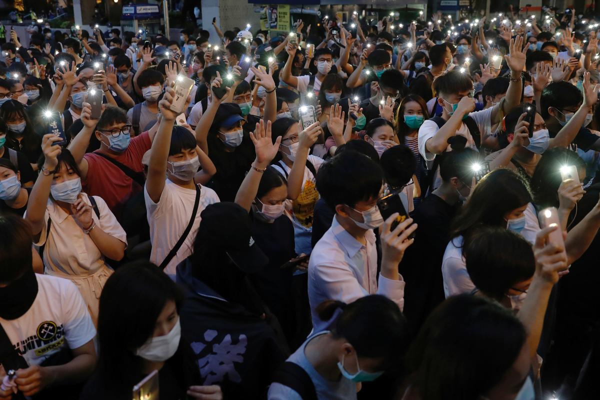 Hong Kong police arrest 53 during fresh pro-democracy protests