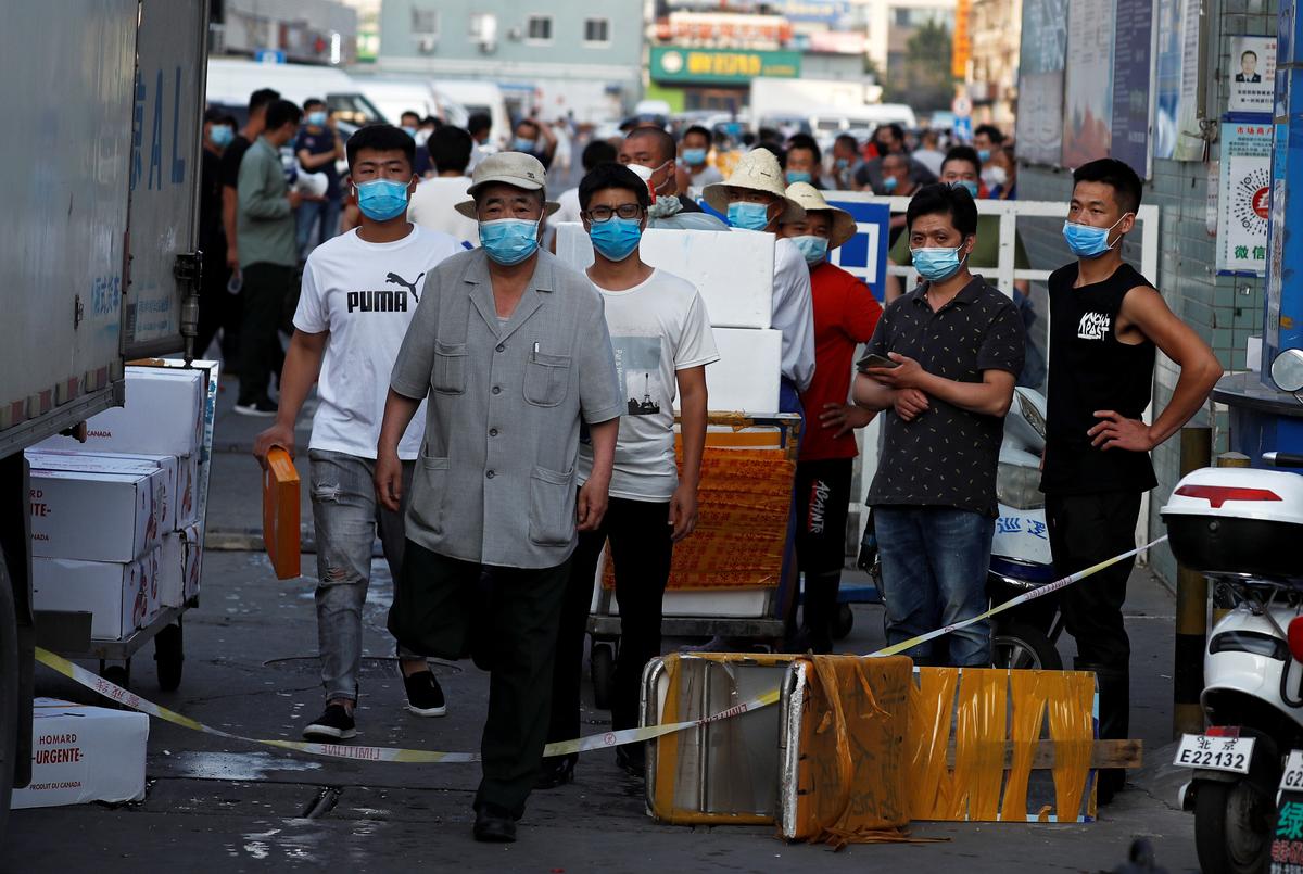 Beijing district in ‘wartime emergency’ after infection spike shuts market