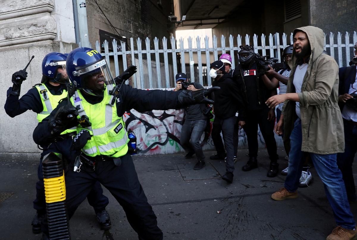 Competing groups and cops clash at London’s Waterloo station