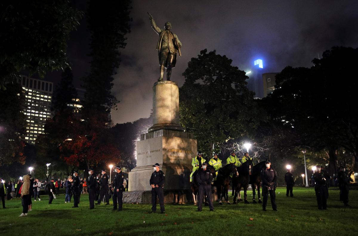 Australian authorities arrest two after Captain Cook statue defaced