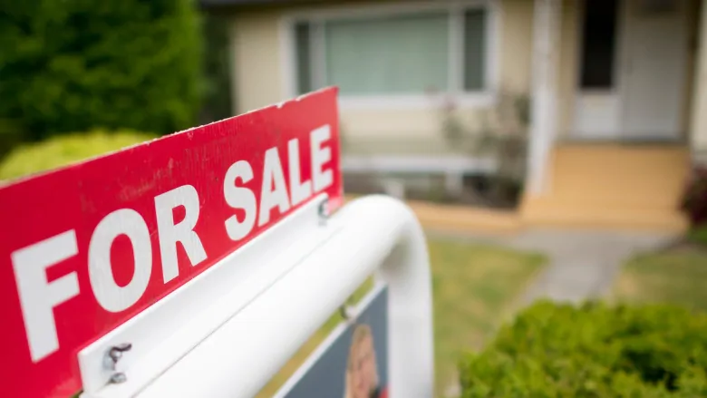 Average house price inches down from last year, even as sales bounce back from record April low | CBC News