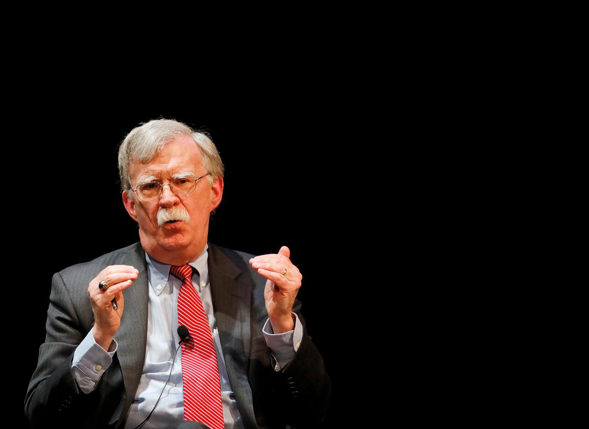 Trump says ex-adviser Bolton will break the law if he publishes book