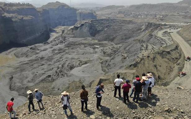 A minimum of 50 dead in landslide at Myanmar jade mine: authorities