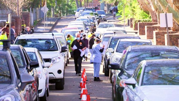 Huge queues outside Sydney coronavirus testing clinic after Woolworths scare