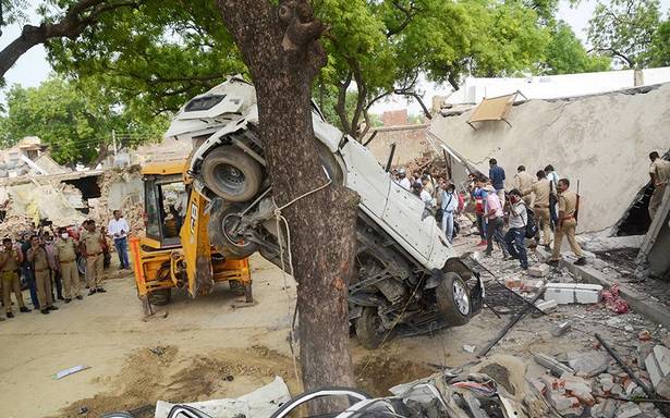 Kanpur attack | As Vikas Dubey evades arrest, U.P. Police demolish his house