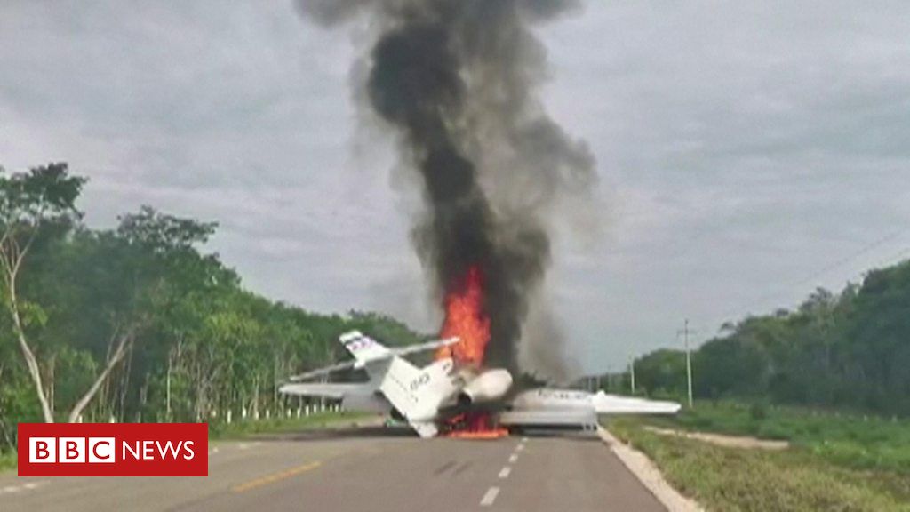 ‘Drug plane’ lands on road and bursts into flames