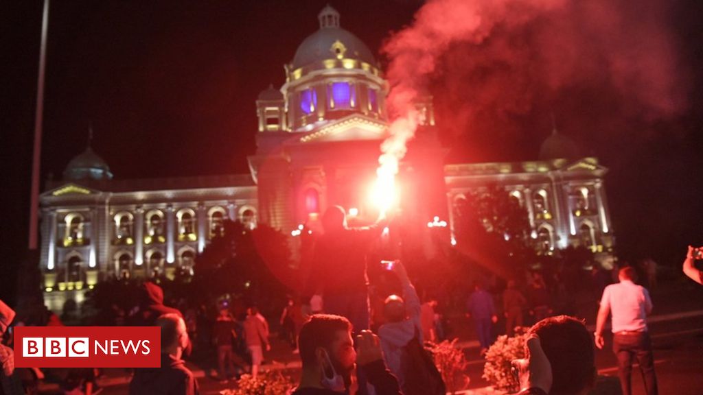 Protesters storm Serb parliament over Covid curfew