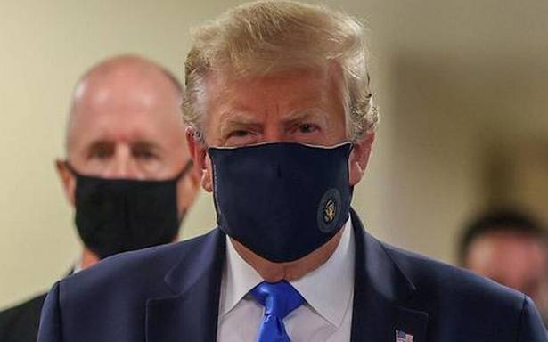 Trump wears mask in public for first time during pandemic